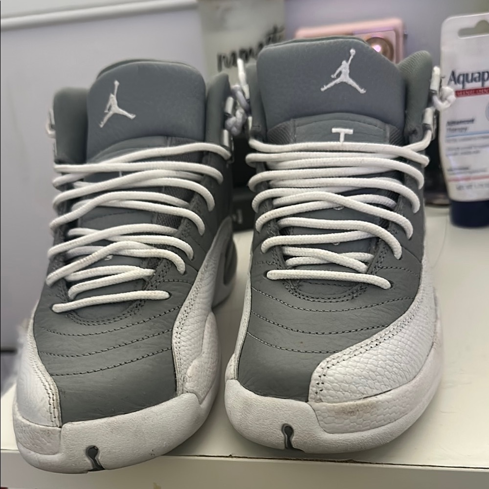 Jordan Gray and White Sneakers with Sporty Design